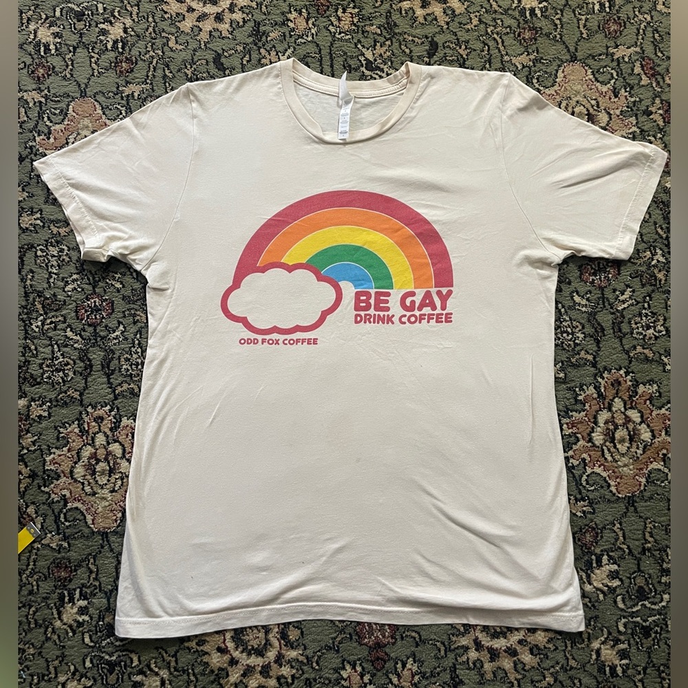 Be Gay Drink Coffee Tee by Odd Fox Coffee